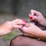 woman doing manicure