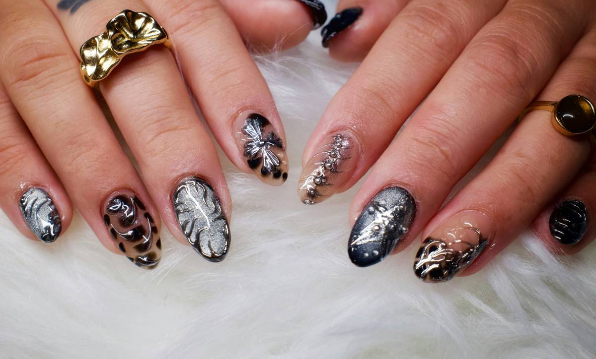 experimental nail art with precise geometric patterns created using nail templates